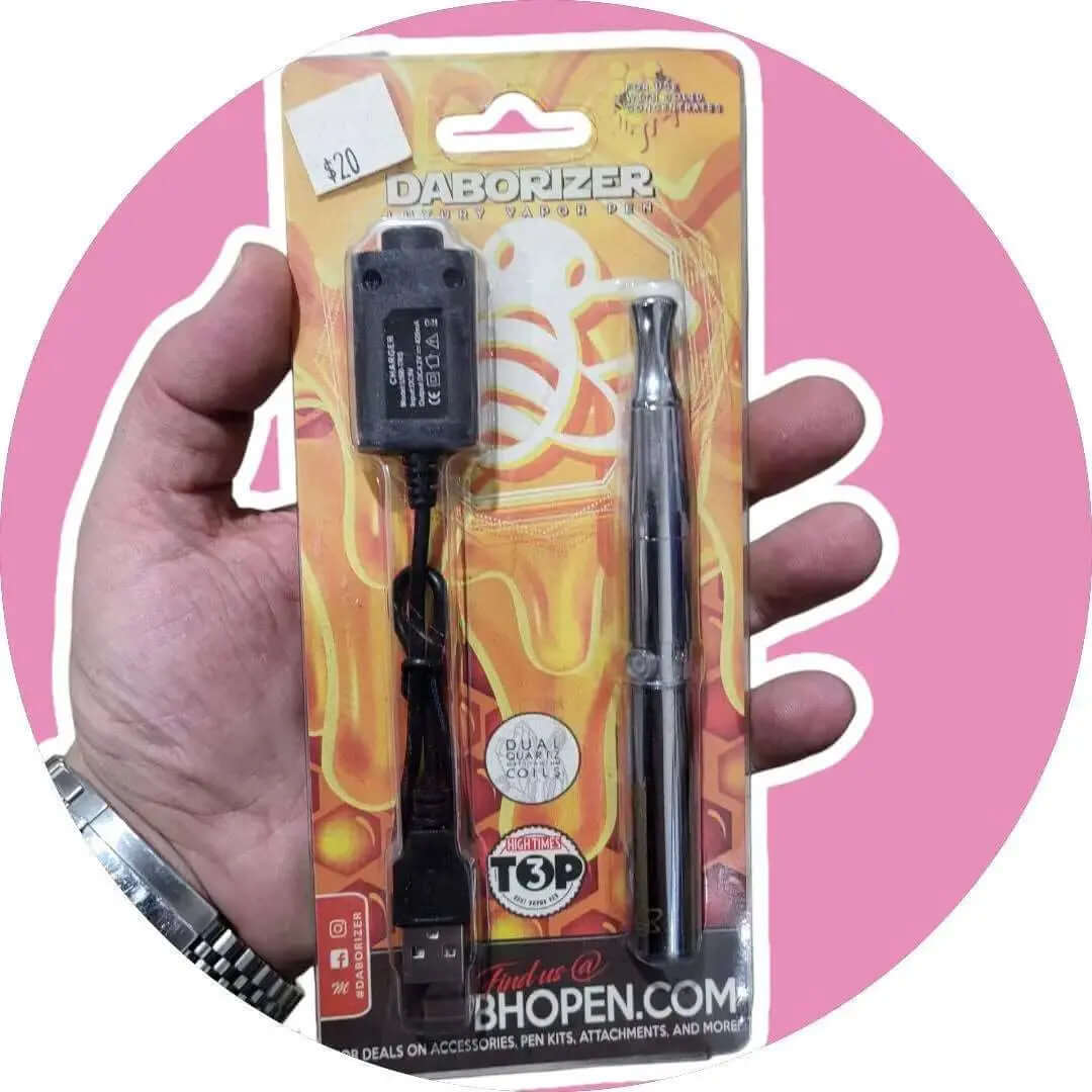 Daborizer Rack Pack - 510 Battery with Wax Vaping Attachment in packaging, includes dual coil atomizer and USB charger.