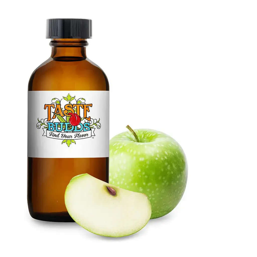 Taste Budds MCT Blend Terpenes bottle next to a green apple and a slice of apple.