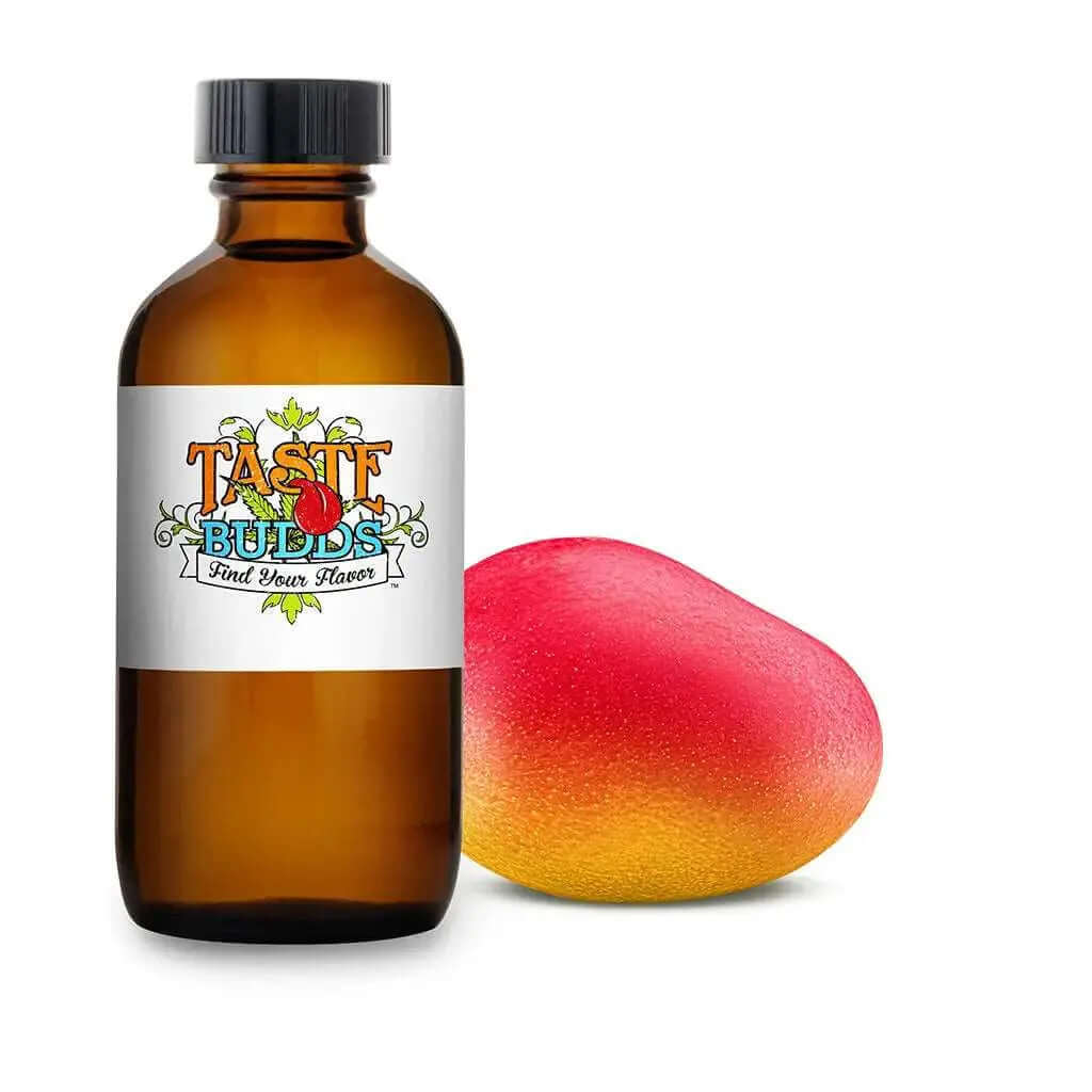 Mango terpenes MCT Blend bottle from Taste Budds next to a ripe mango, highlighting tropical flavors and aroma.
