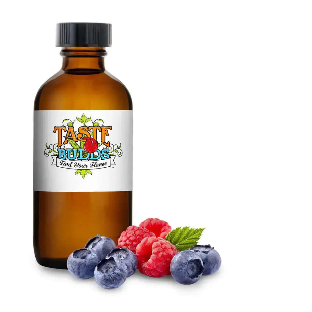 Taste Budds MCT Blend Terpenes in amber bottle with fresh raspberries and blueberries for a refreshing experience.