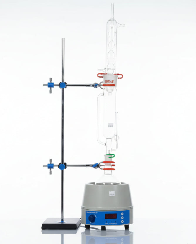 Sohxlet Extractor apparatus for efficient solvent extraction in laboratory settings, featuring reflux condenser and boiling flask.