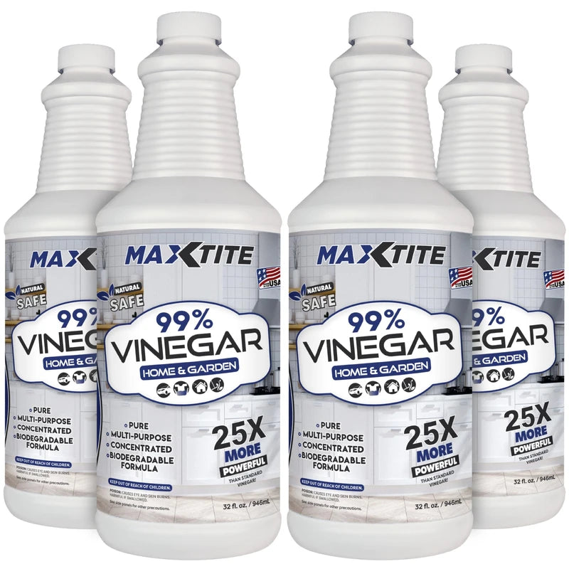 Four bottles of Maximum Strength Vinegar 99% Purity, 1 quart each, displayed with label details.