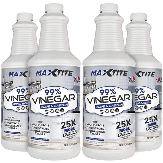 Four bottles of Maximum Strength Vinegar 99% Purity, 1 quart each, displayed with label details.