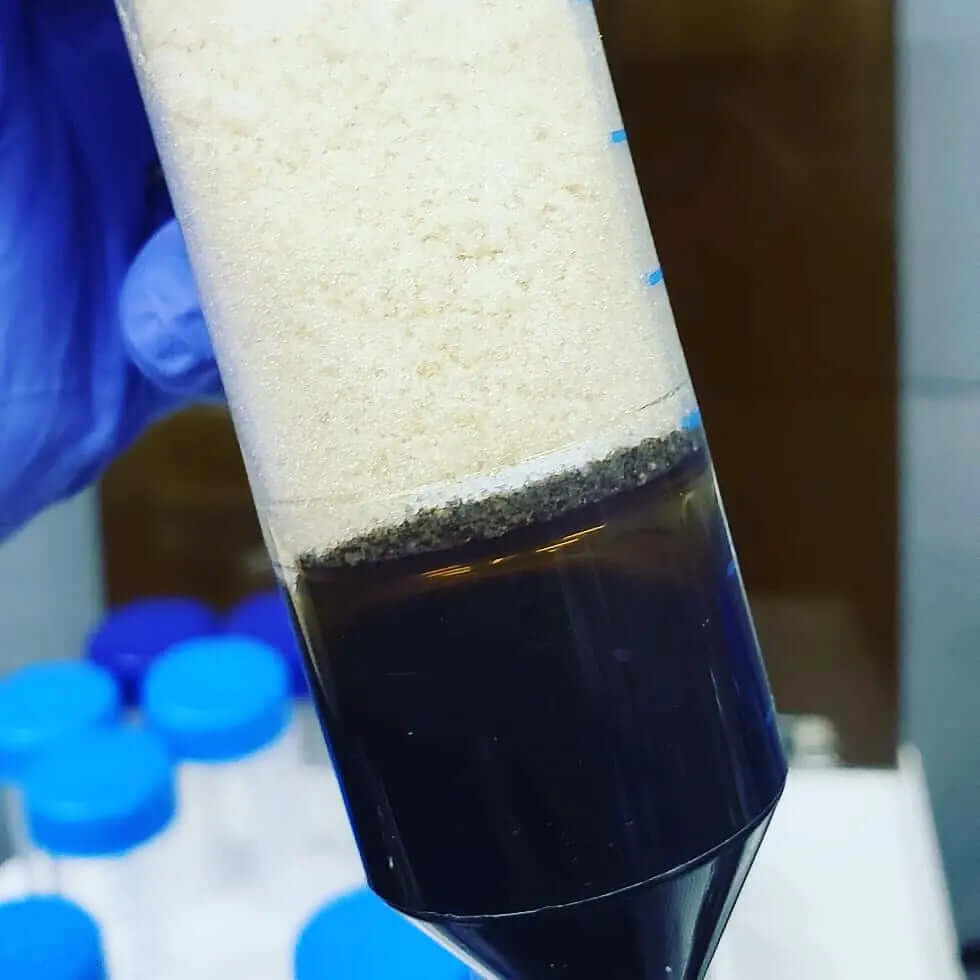 Close-up of a 50ML Centrifuge Tubes Leak-Proof Laboratory Grade in use for sample separation in a lab setting.
