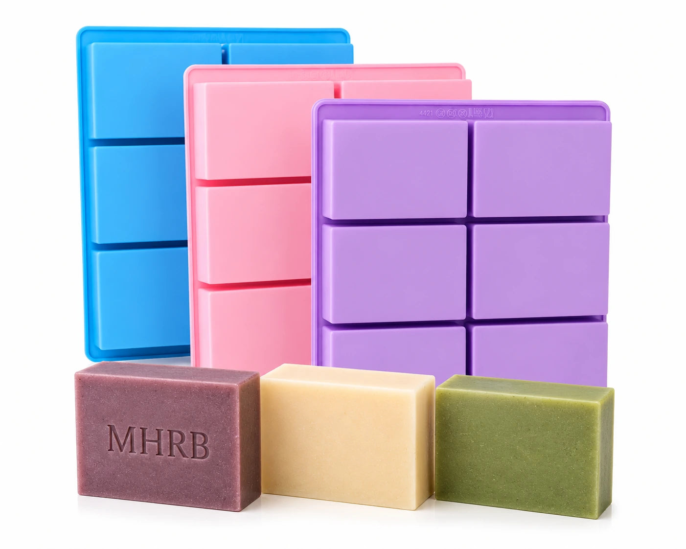 Set of 3 Platinum Cured Silicone Soap Molds in blue, pink, and purple with sample soaps in front.